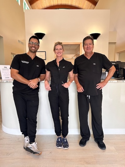 Sara Levene, APRN, BC (center) with Dr. Davek Sharma (left) and Dr. Joseph Mazza (right)